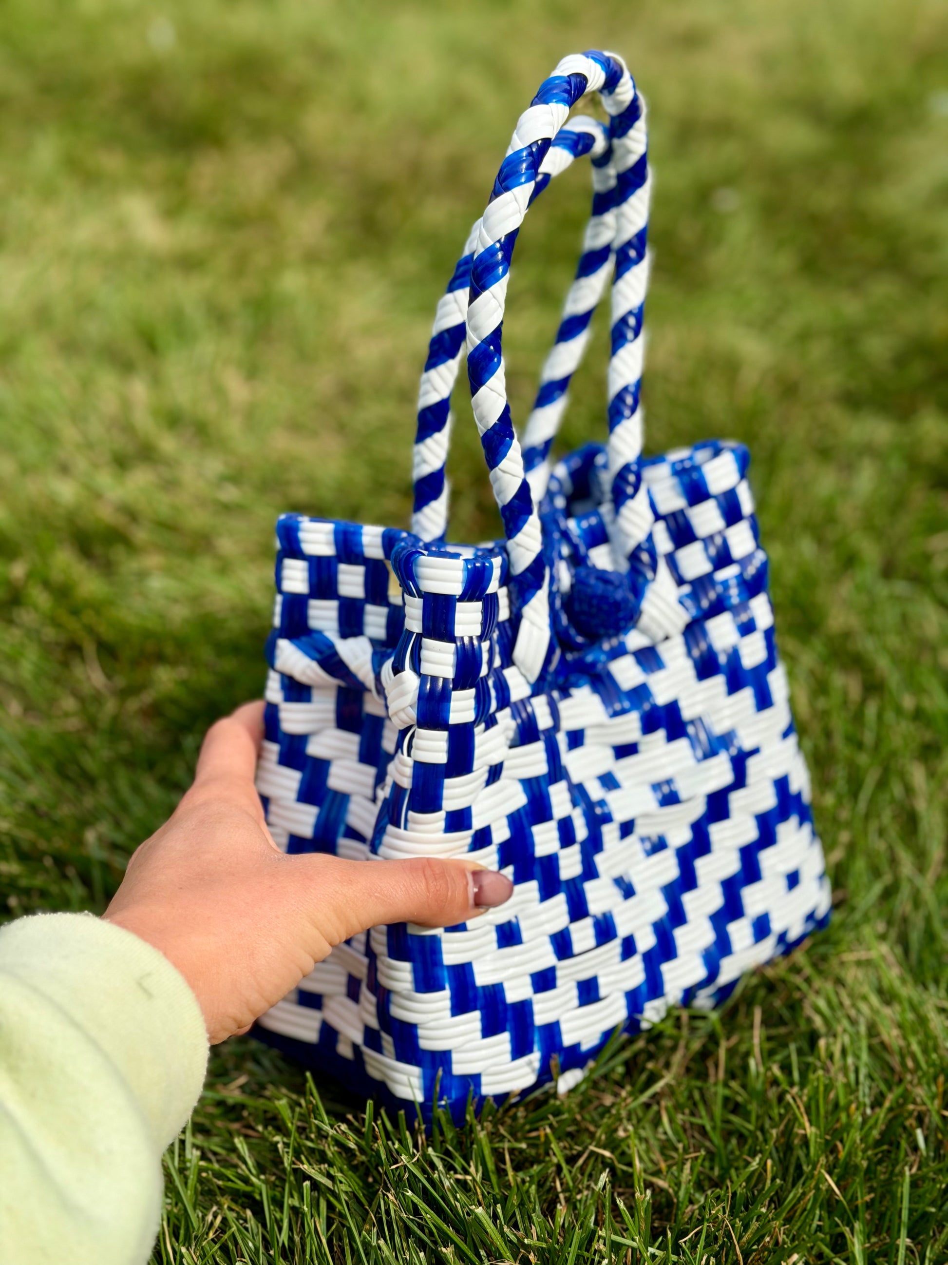 Mini recycled purse that is waterproof made in the Philippines